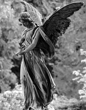 Angel statue figure cemetery stone sculpture artwork wing melancholic thumbnail